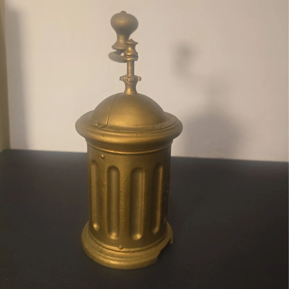 Antique F&B Tre Spade hand-crank coffee grinder with embossed three-spade logo.